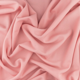 Stof Milano krepp abrikozen tricot met steentjes 0,5m