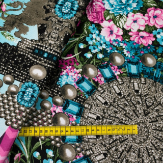 Stof Jersey ITY roze bloemen gebreide stof 0,5m