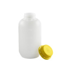 Fľaša HDPE 500 ml okrúhla so žltým uzáverom s poistkou – odolná fľaša na chemikálie, laboratórne a priemyselné použitie
